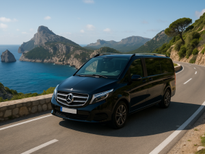 a Mercedes V-Class car driving on a coastal highway near Cap Formentor in Mallorca